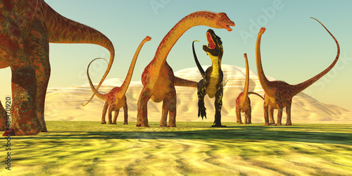 Fotografia Diplodocus Jurassic Herd - A theropod Torvosaurus tries to bring down a Diplodocus dinosaur during the Jurassic Period