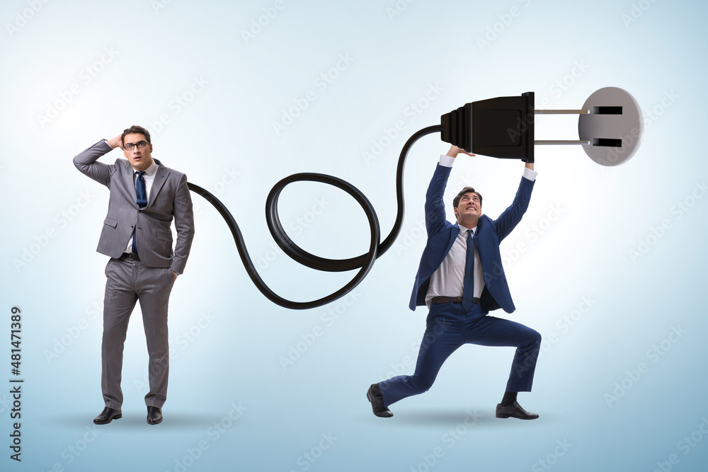 Businessman being powered by electric power Businessman being powered by electric power