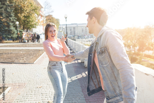 Couple having fun together outdoors. Man and woman happy.