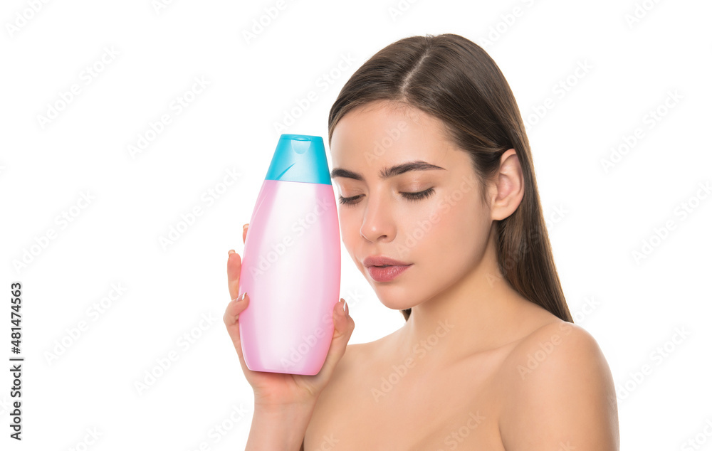 young woman hold shampoo bottle isolated on white background with copy space, shampooing young woman hold shampoo bottle isolated on white background with copy space, shampooing
