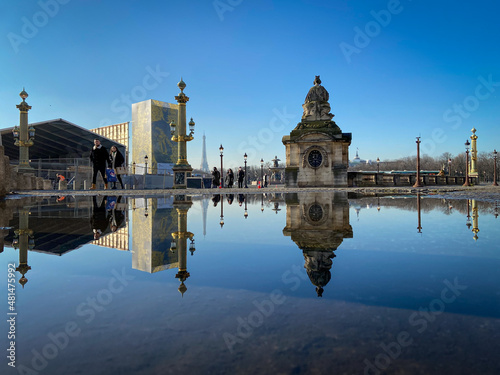 Paris,France - 12 04 2021: View of the Place de la Concorde reflecting in a puddle © Franck Legros