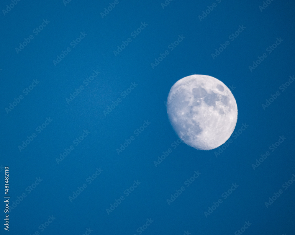 full moon over blue sky full moon over blue sky
