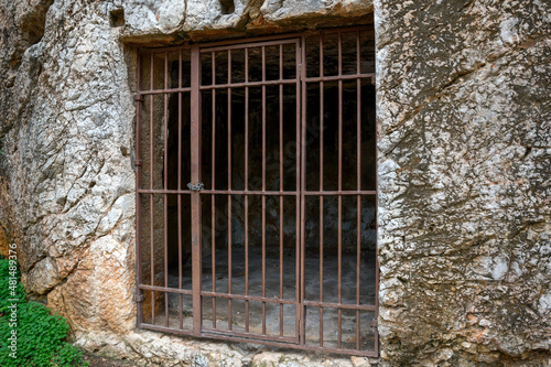 The prison of Socrates, the ancient Greek Philosopher, on Philopappos or Filopappou Hill in Athens, Greece. photo