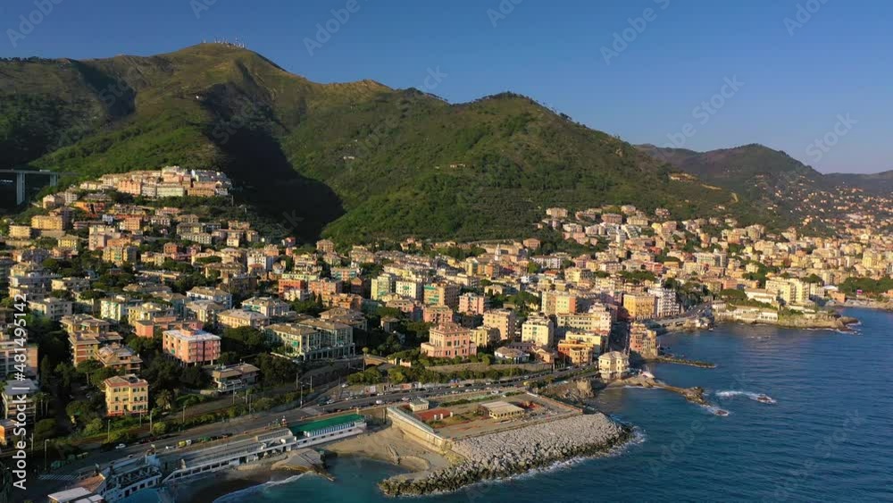 Aerial view around villas on the coast of Genova quarto, golden hour in Italy - circling, drone shot