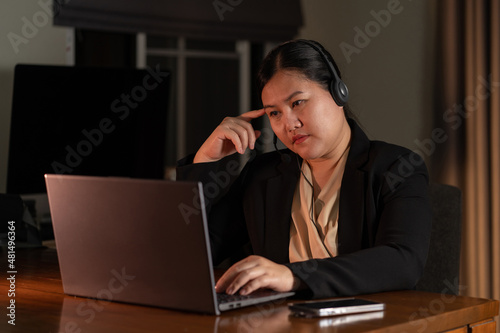 Telemarketing customer service asian woman working in call center office