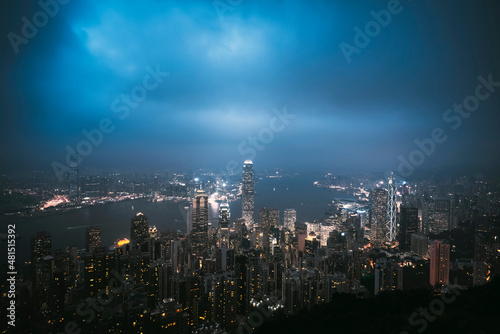 A view of the city at night from the top of the Taiping mountain in Hong Kong.
