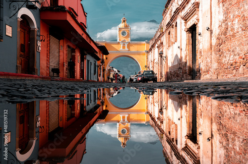 Arco De Santa Catalina, Guatemala Puddle Reflection on Cobblestone Street