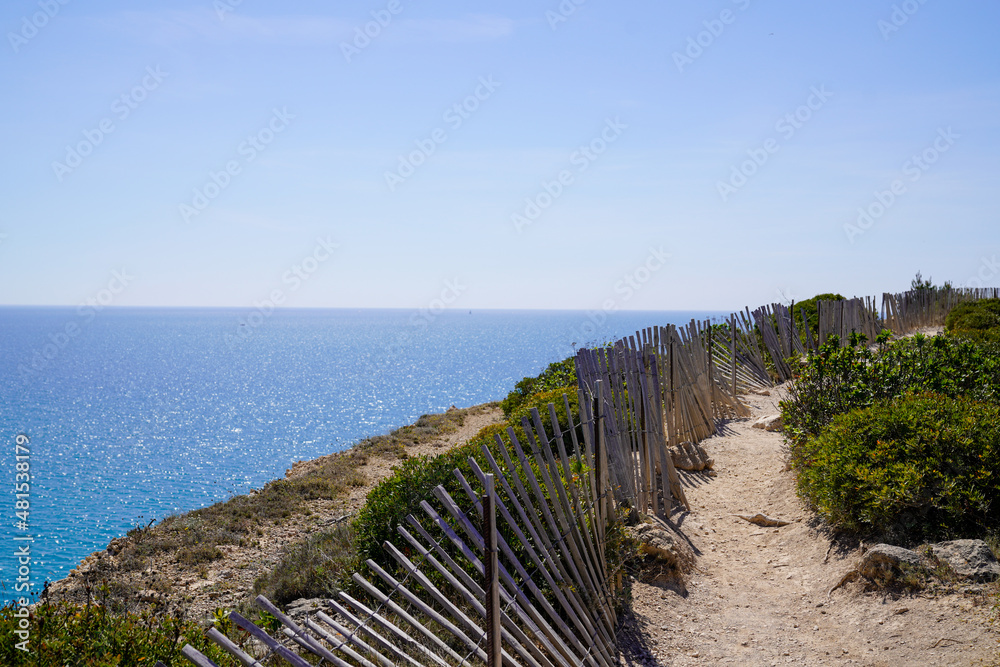 Leucate pathway wooden fence natural coast in french Occitanie south france