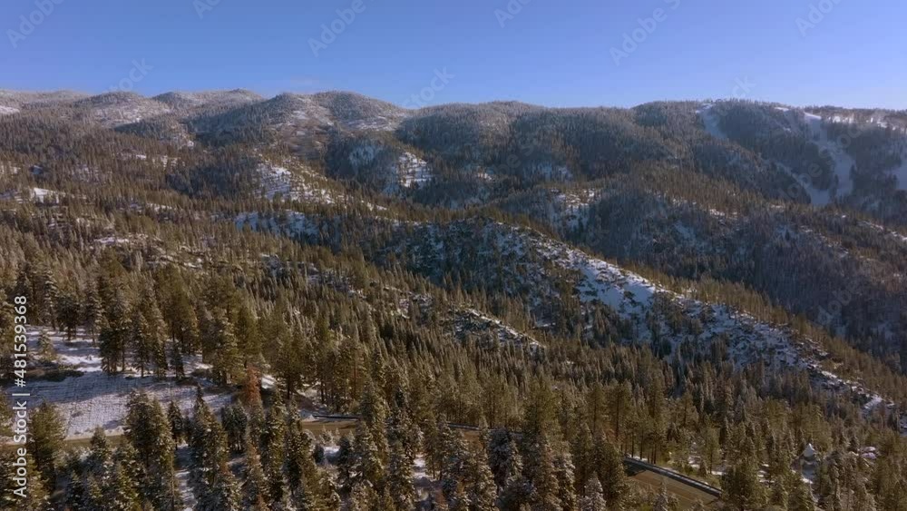 Mountain ridge in Lake Tahoe, Nevada with car driving down the road. Mountain ridge in Lake Tahoe, Nevada with car driving down the road.