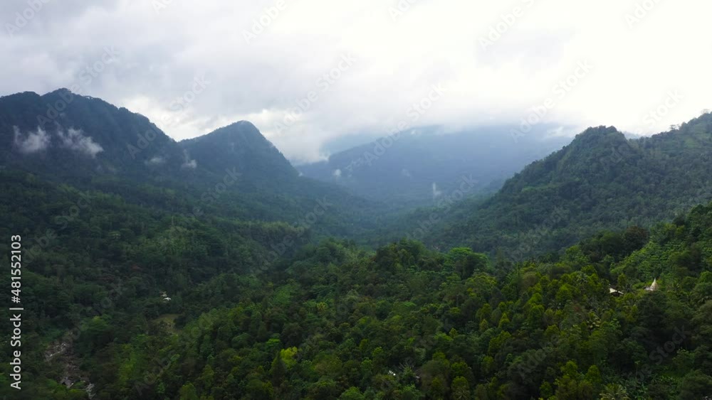 Aerial view of Mountains covered rainforest, trees and blue sky with clouds.Sri Lanka. Aerial view of Mountains covered rainforest, trees and blue sky with clouds.Sri Lanka.