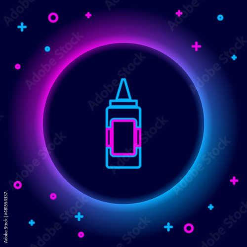 Glowing neon line Mustard bottle icon isolated on black background. Colorful outline concept. Vector
