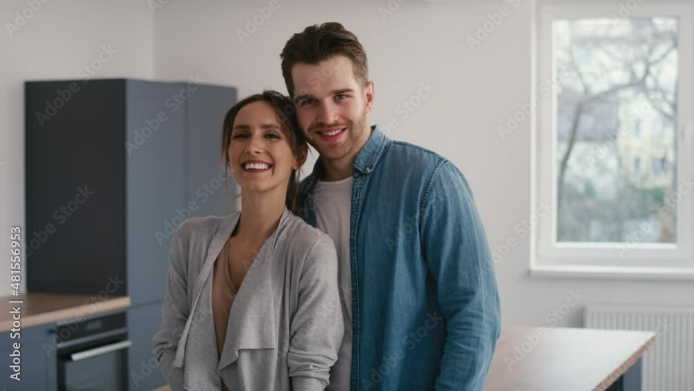 Portrait of cheerful caucasian in empty new house. Shot with RED helium camera in 8K. Portrait of cheerful caucasian in empty new house. Shot with RED helium camera in 8K.