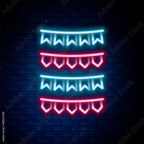 Glowing neon line Carnival garland with flags icon isolated on brick wall background. Party pennants for birthday celebration, festival and fair decoration. Colorful outline concept. Vector