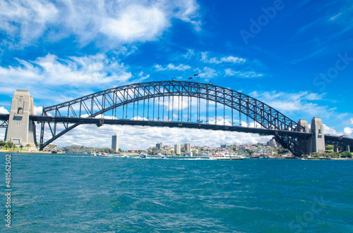 Beautiful dramatic cloudscape above Sydney Harbour bridge in sunshine day. © arliftatoz2205