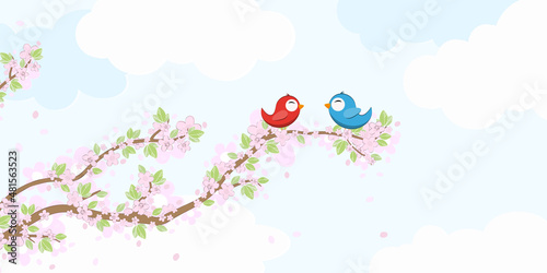 Birds in love on blossom branches