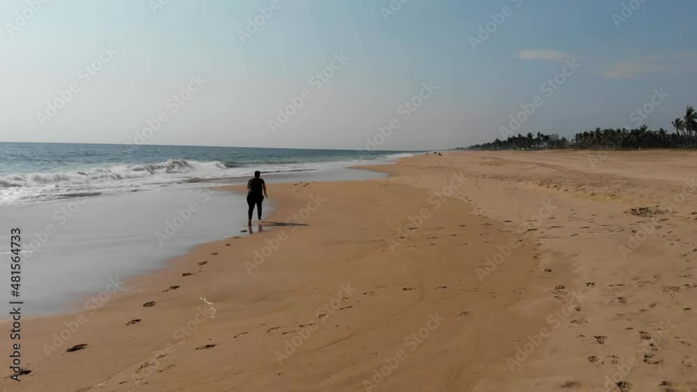 person
running along the beach in 4k person
running along the beach in 4k