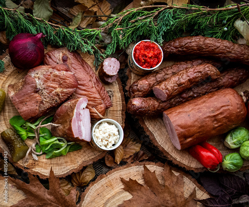 Assortment of cold meats: sausages, ham, bacon