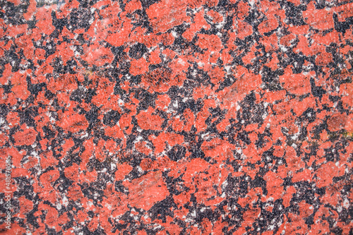 Artificial stone background burgundy black granite.Macro view of granite stone texture as background. Artificial stone background for interior decoration, countertops © kvdkz