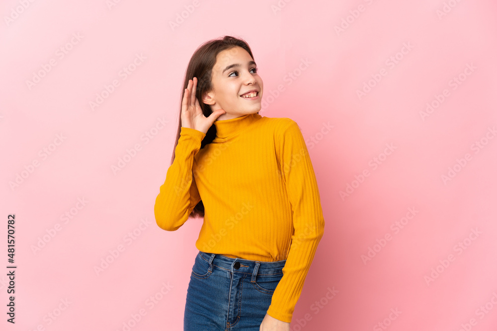 Little girl isolated on pink background thinking an idea Little girl isolated on pink background thinking an idea