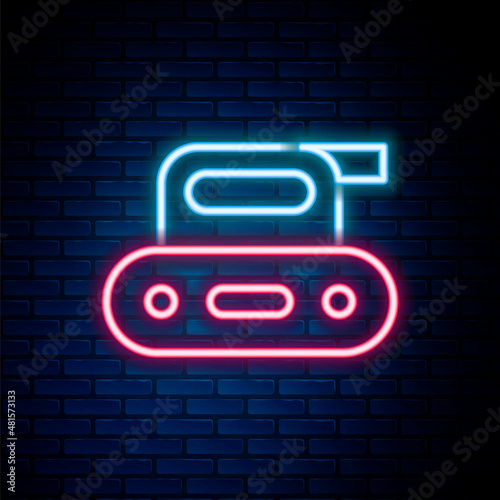 Glowing neon line Electric planer tool icon isolated on brick wall background. Colorful outline concept. Vector