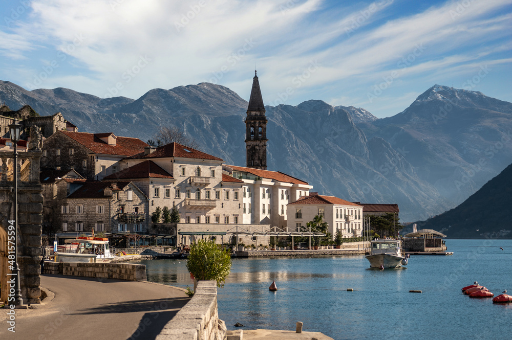 Panoramic view of town of Perast, Montenegro and bay of Kotor. Historic city of Perast in Bay of Kotor. Panoramic landscape Kotor bay in Montenegro at sunset.