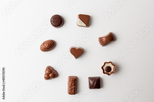 Chocolates with heart shape isolated on white background.