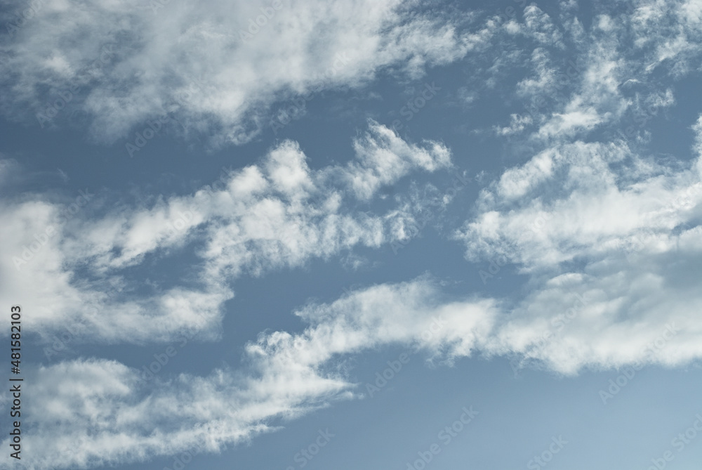 Scattered white cloud in high sky atmosphere. Natural fluffy cloud in light blue sky background sunny day.