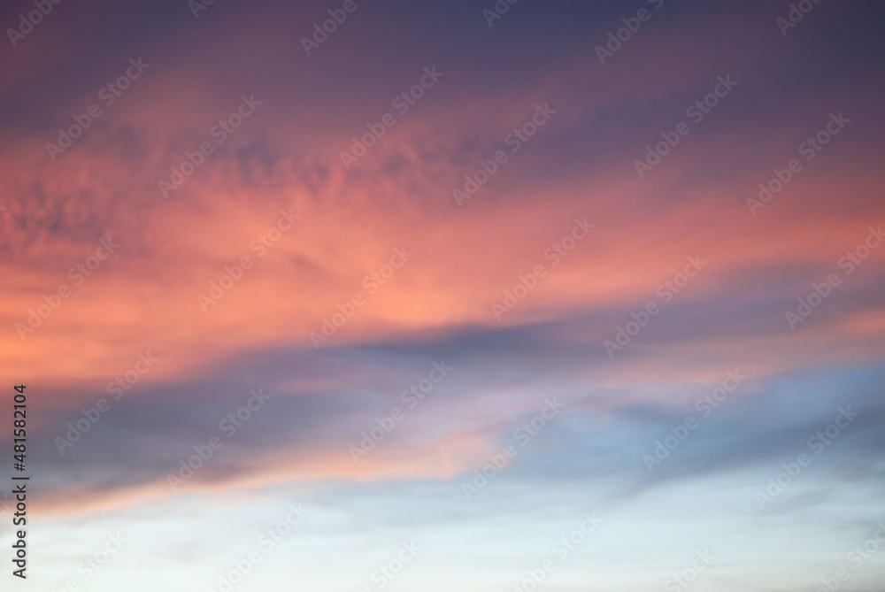 Emotional colorful sky after sunset. A magical nature of light phenomenon in evening sky background.	