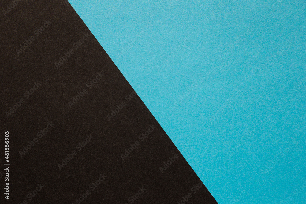 Black and blue paper stacked on top of each other. Black and blue paper stacked on top of each other.