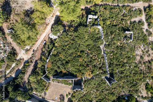 Ruins of the antique castle Gedelme Kalesi in the valley of the Taurus mountains in Turkey photo