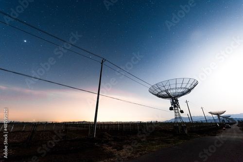 An astronomical radio telescope working at night