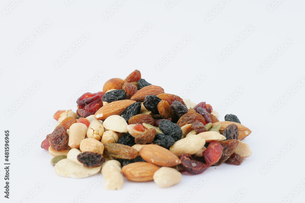 close up of many mixed nuts on white background close up of many mixed nuts on white background