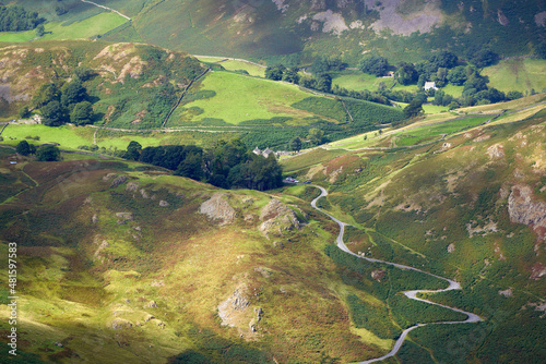 A twisting hairpin road leading to St Peter's Church, Martindale in The Combs in the English Lake District, England, UK.