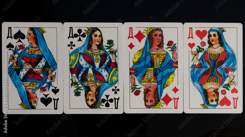 Poker Q playing cards isolated on black backgroung