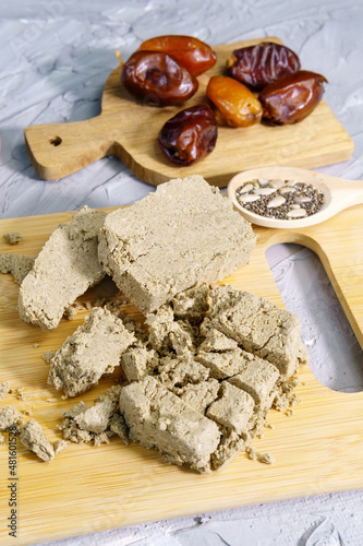 Sunflower halva. Halva pieces grey background. Top view. Vertical photo photo