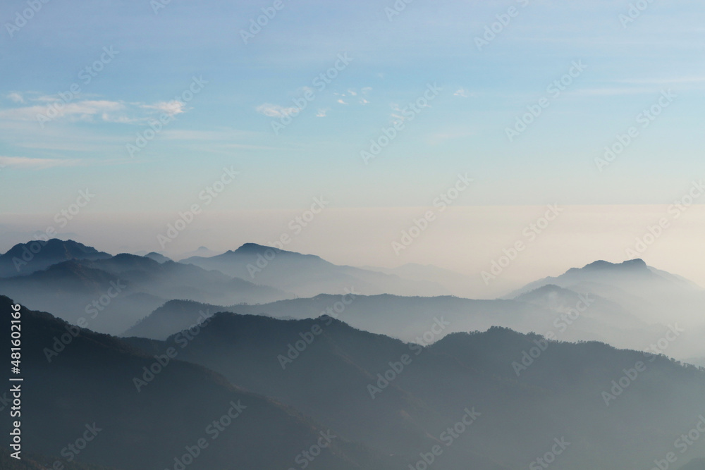 Fototapeta premium Abstract natural background - a beautiful view of the mountain peaks. Horizon, sky and Himalayas.