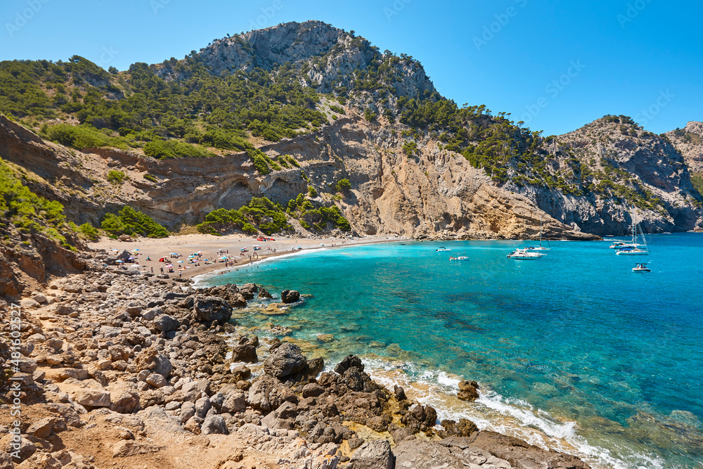 Turquoise waters in Mallorca. Coll Baix beach. Mediterranean coastline. Balearic