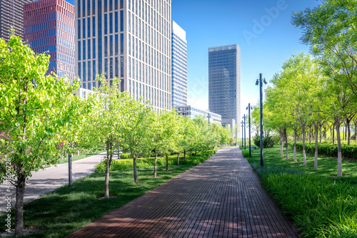 Cityscape intelligent building ,hold smart phone for build and make your green city.