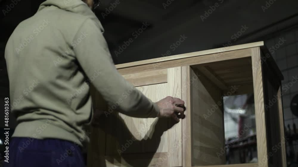 A guy makes furniture. A man makes a table. Woodwork. A guy makes furniture. A man makes a table. Woodwork.