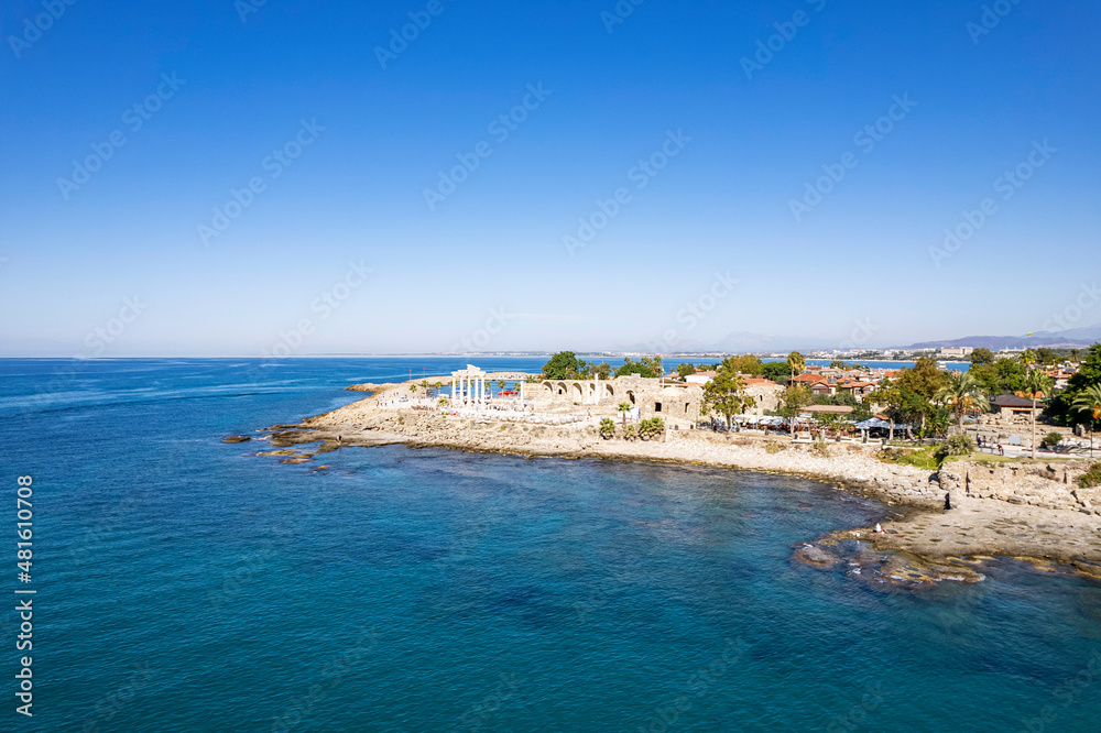 Aerial drone View Of Side Antique City . Side Old Town amphitheater. Side Harbor marina in Antalya Turkey drone photo view