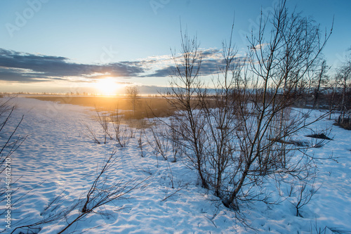 spring arctic tundra at sunset