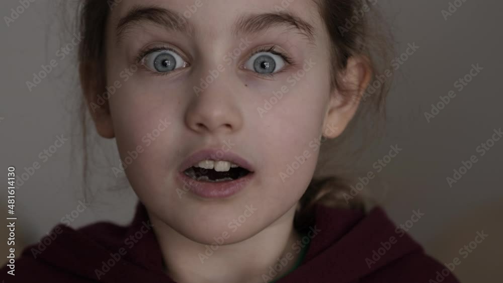 Teenager Looks and is Surprised Happy to Receive Surprise. Portrait School Girl With Blue Eyes Looking at Camera. Portrait of Young Child Teen Girl Surprised Shocked. Kid Joy Amazement on Face. Teenager Looks and is Surprised Happy to Receive Surprise. Portrait School Girl With Blue Eyes Looking at Camera. Portrait of Young Child Teen Girl Surprised Shocked. Kid Joy Amazement on Face.