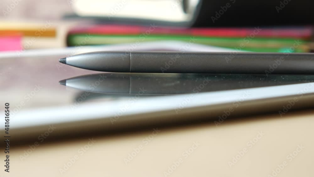  digital tablet and graphic on table 