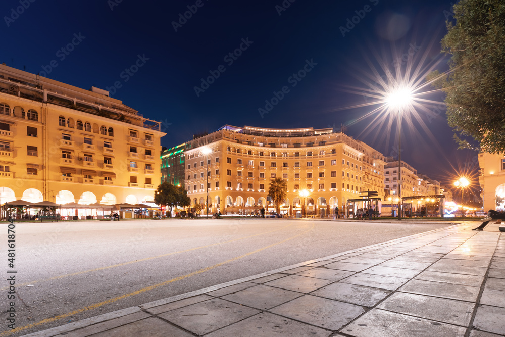 view of main tourist attraction of Thessaloniki - Aristotle Square with cafes and hotel buildings. Travel, life and real estate in Greece and Macedonia region concept