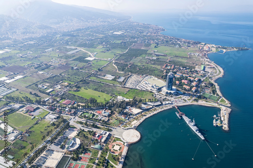 Inciralti District coastal and Ozdilek Wyndham Otel view in Izmir City. inciralti has recretional area and fishing boats in Izmir. © Suzi