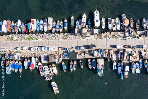 Inciralti District coastal and Ozdilek Wyndham Otel view in Izmir City. inciralti has recretional area and fishing boats in Izmir.