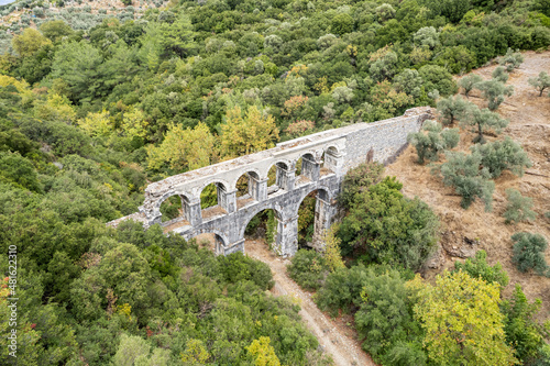 Ruins of ancient Pollio aqueduct bringe in Izmir Province. Turkey photo