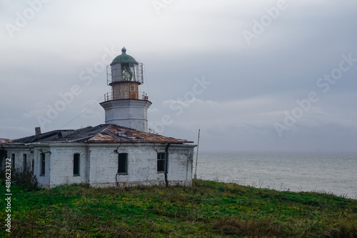 Lighthouse Jonquiere and the coast at sunset