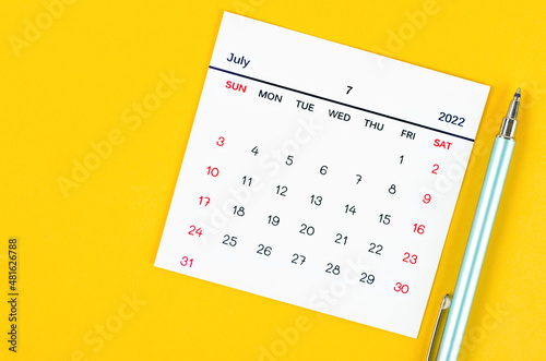 July 2022 calendar on yellow background.