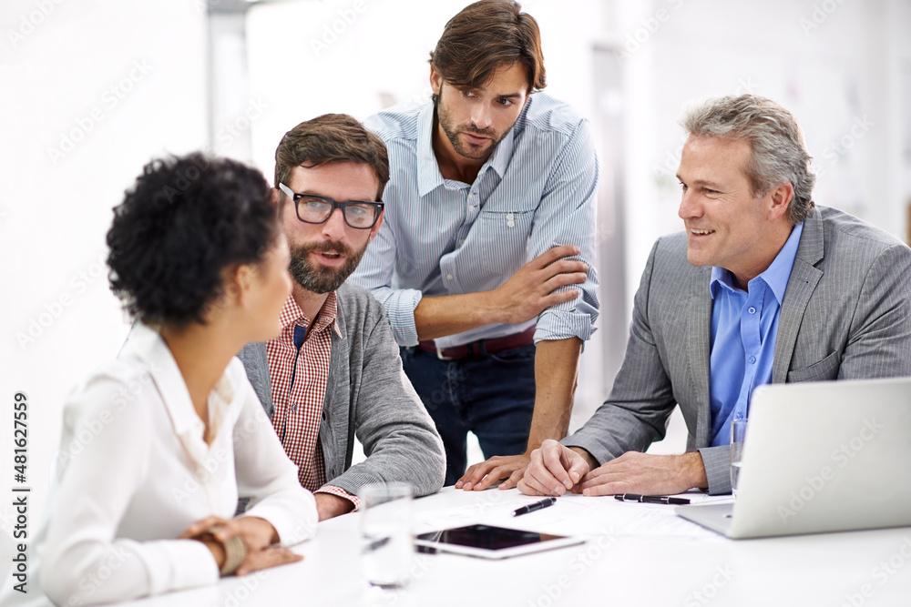 Leading his team through the creative process Leading his team through the creative process